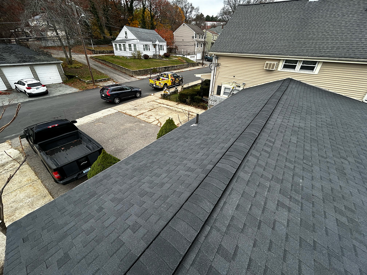 Finished ridge cap installation on a residential roof