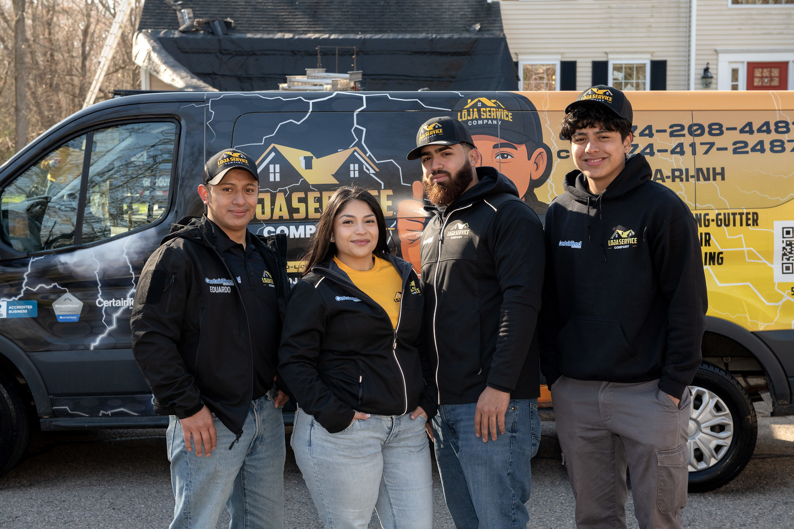 Loja Service leadership team in front of company van