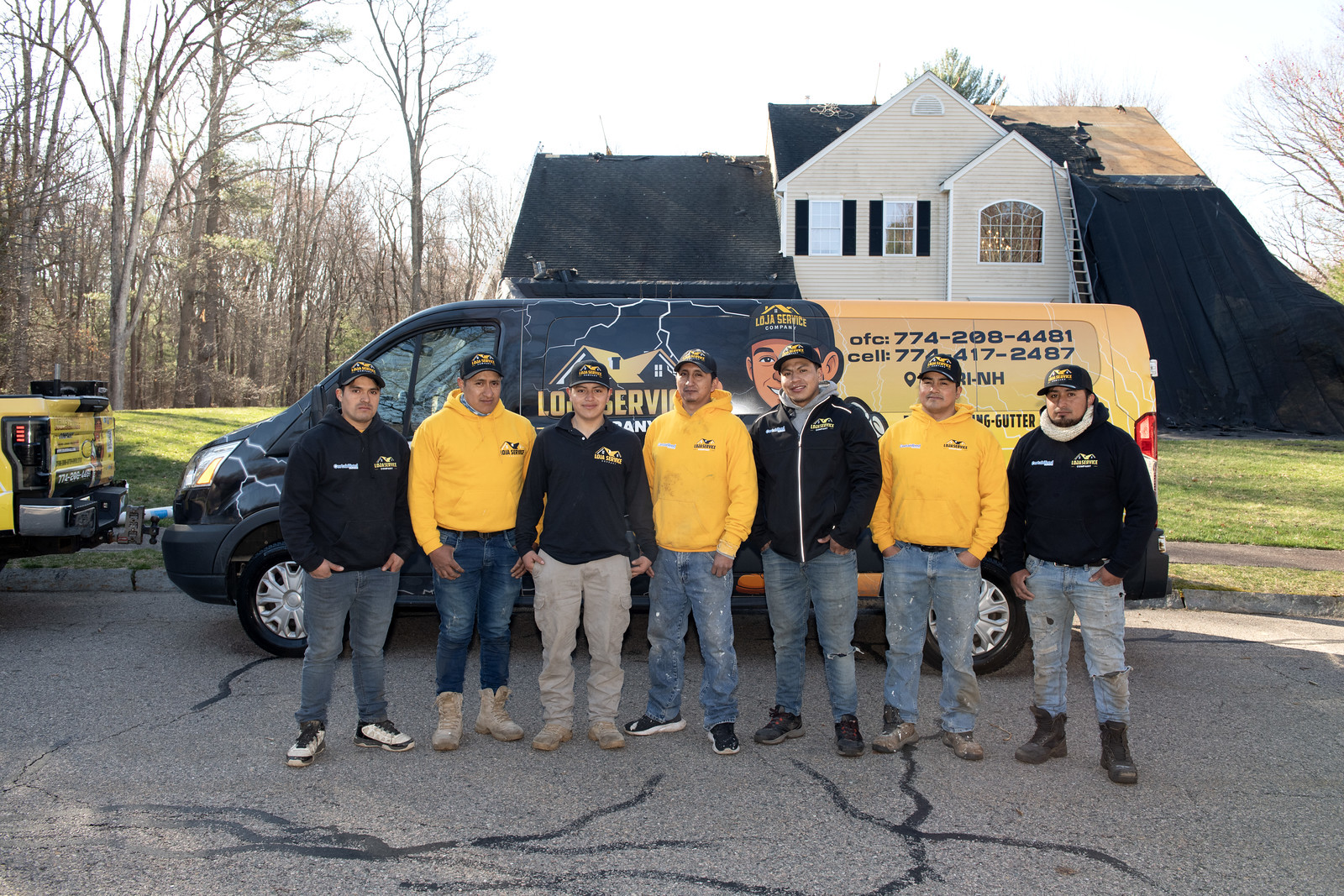Loja Service crew with branded service vans